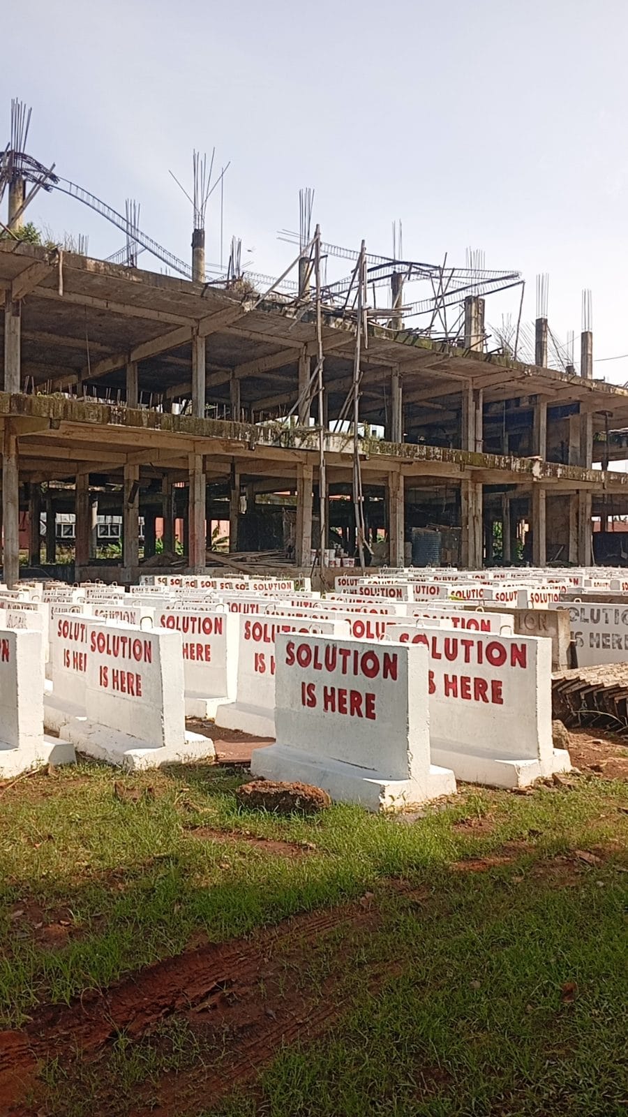 Latest site photograph of The production and installation of 500 pieces of flourescent" solution is here" concrete signage for the branding of all landmark infrastructures across the state (phase 2)